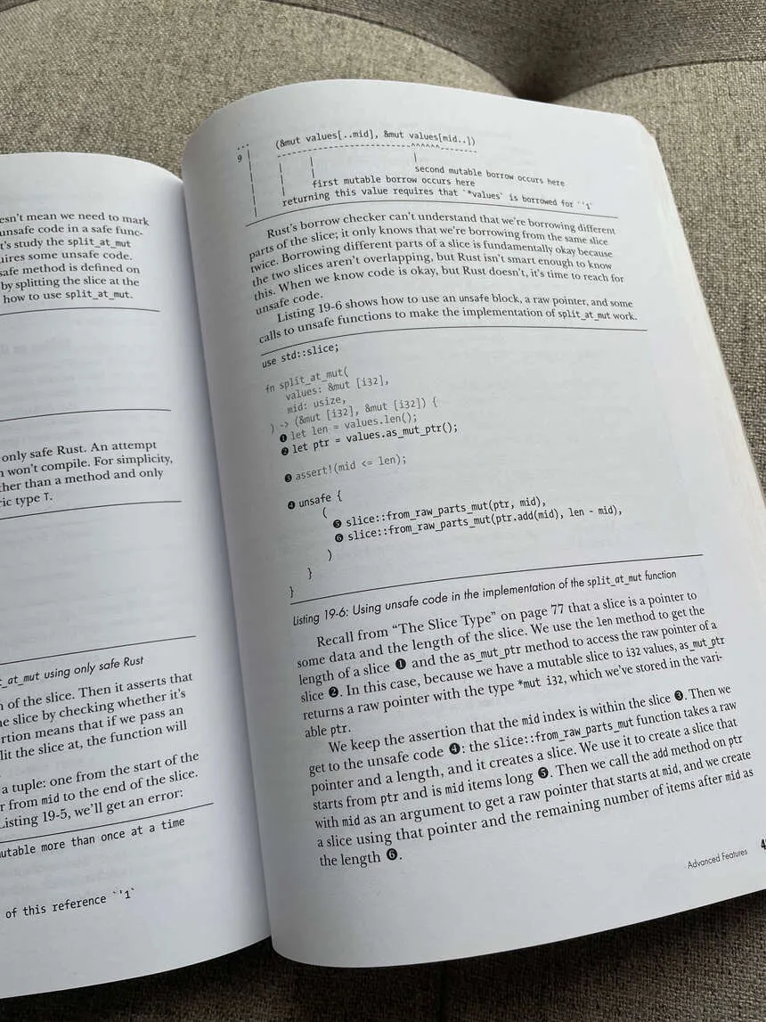 Open book showing a page about unsafe code in Rust