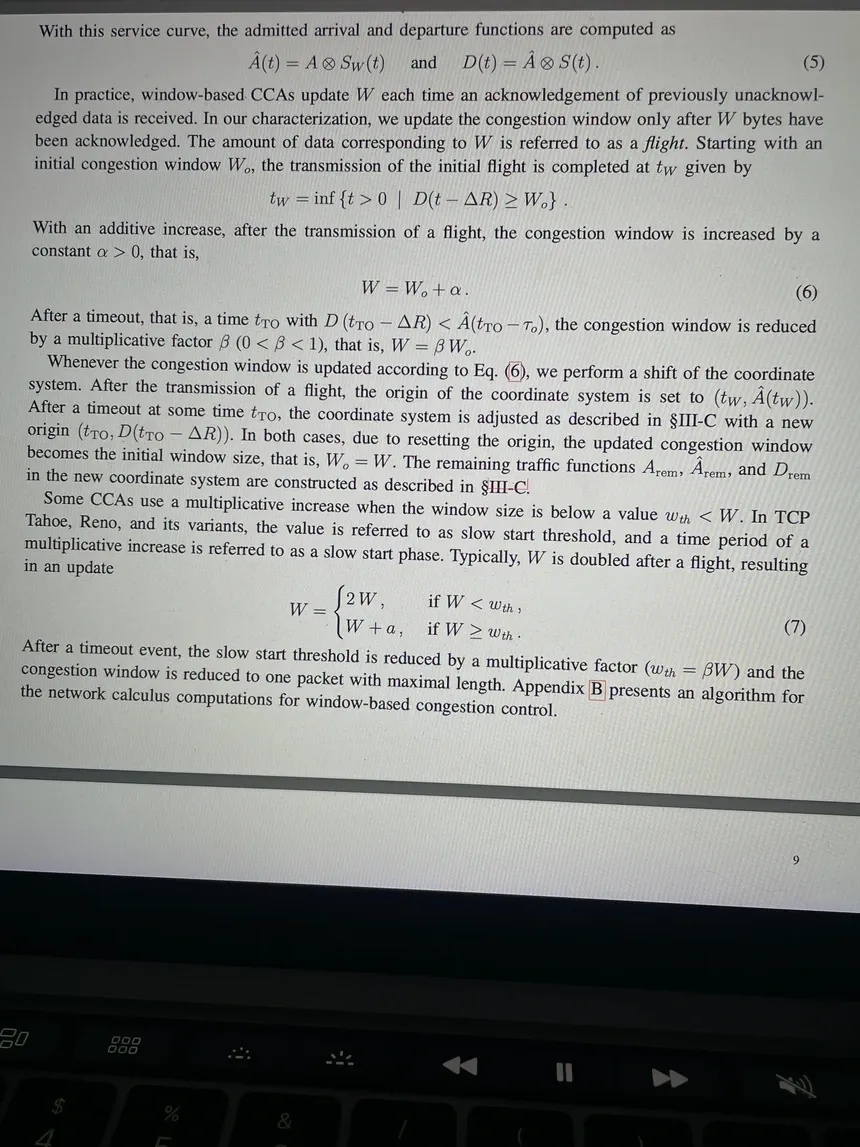 Laptop screen showing a research paper on network congestion control